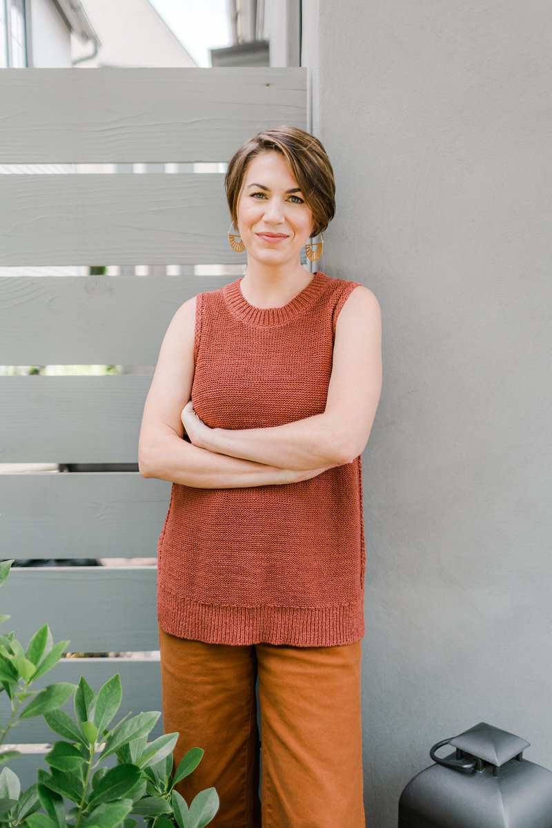 Career coach Laura Simms sits in home office