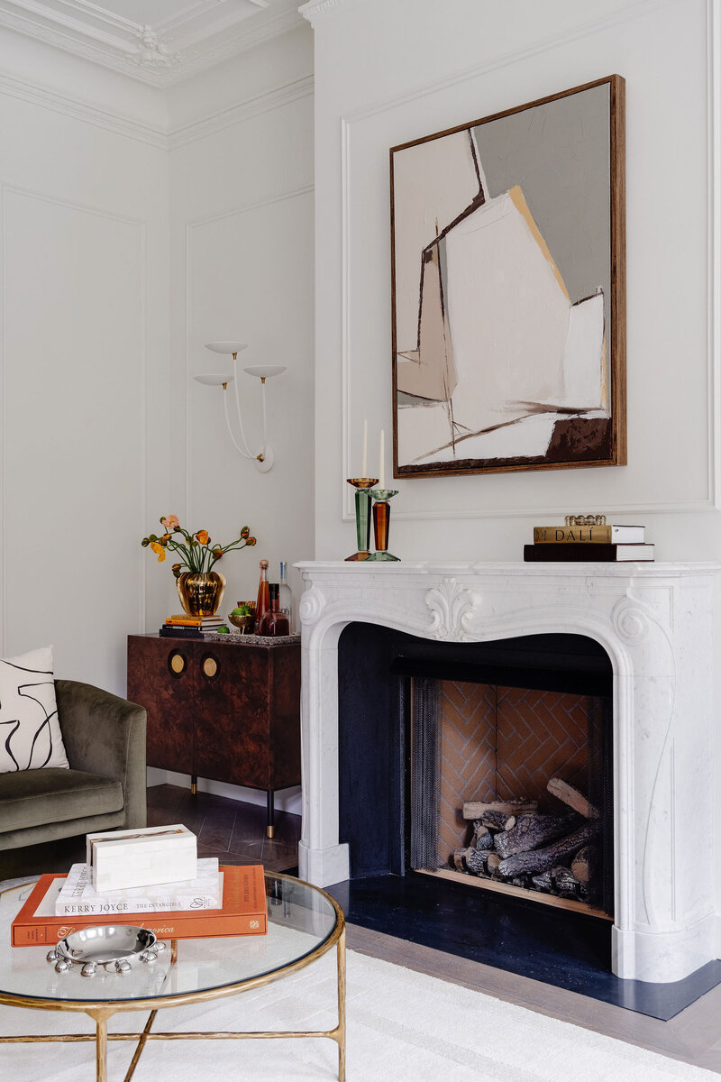 Hand-carved Carrara marble mantel in Boston's Back Bay living room