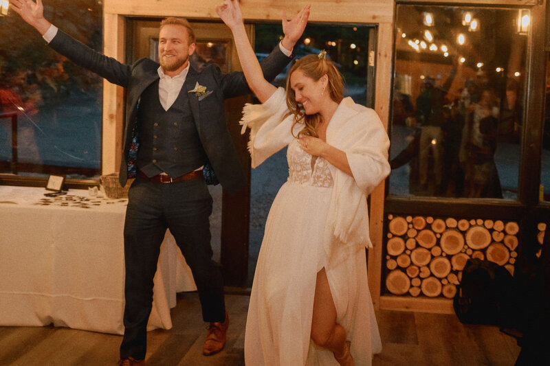 A bride and groom celebrating together.