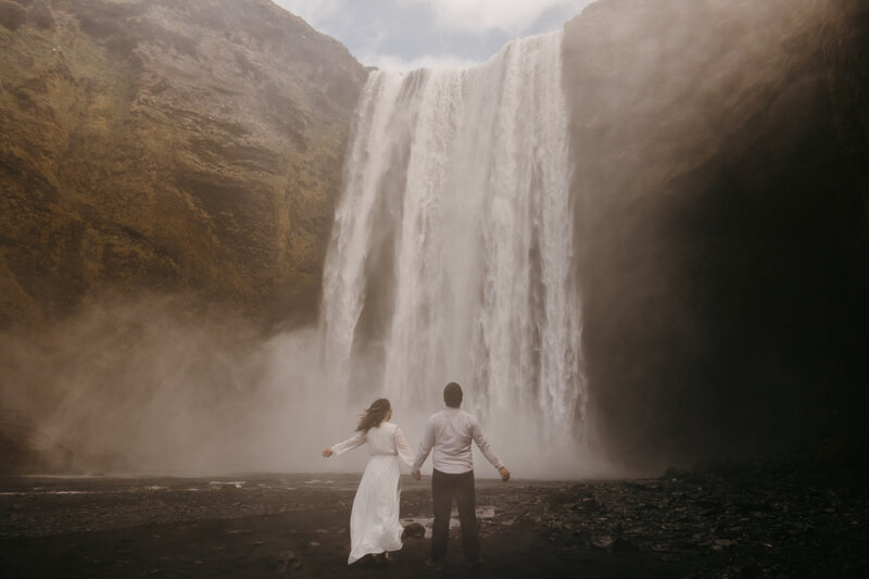 Abi and Josh in wedding clothes in Iceland