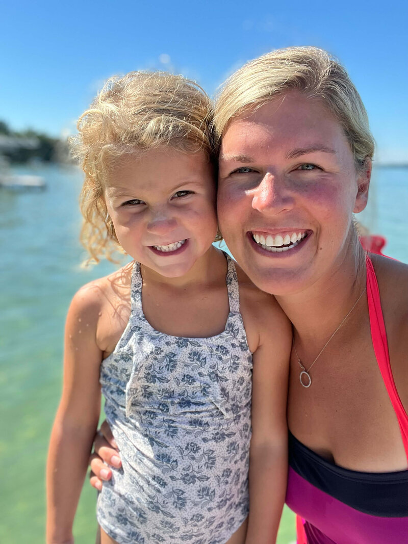 Alison and her daughter posing for camera