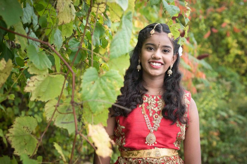 teenage girl posing in a sari