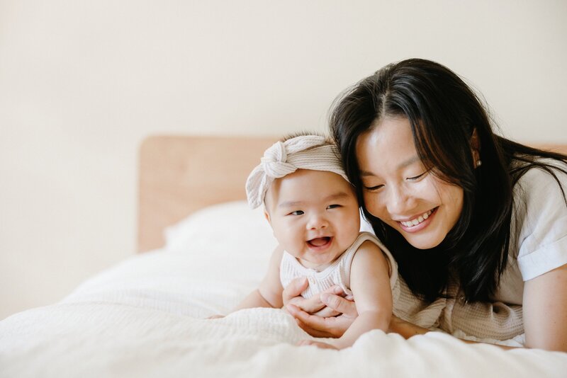 Mother and young baby captured joyfully at home in Sydney