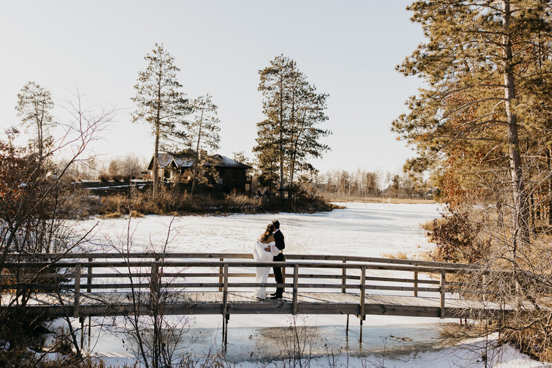 A photo of a couple beside a tree