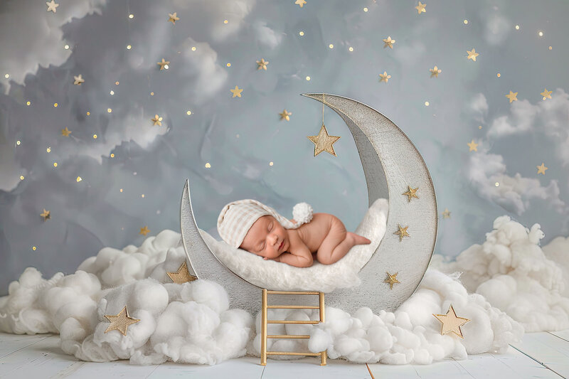 baby boy sleeping on a moon, digital composite