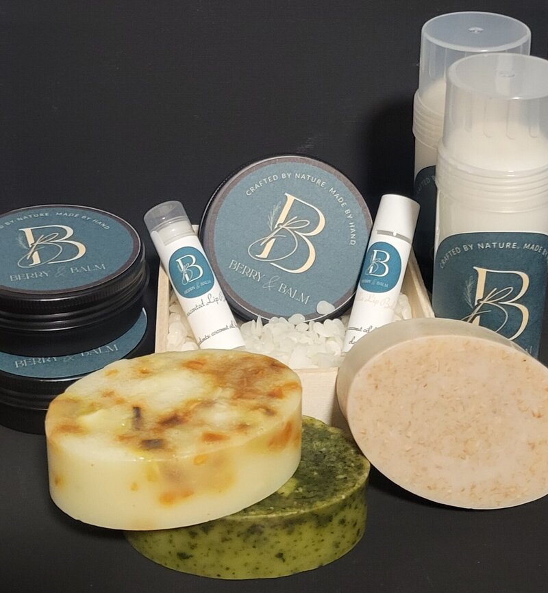 Berry & Balm gift set with soaps and balms arranged in a kraft box with crystals