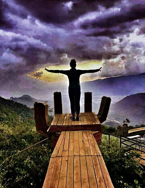 Lisa Kummer parting the clouds to create a path forward
