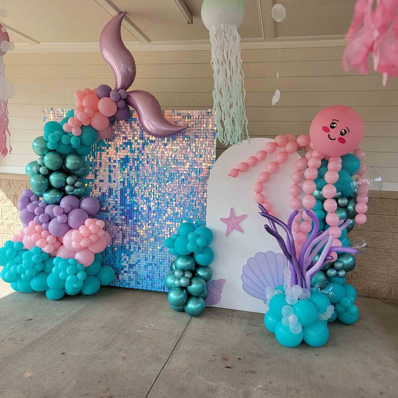 A magical underwater atmosphere with our Custom Balloon Pink and Purple Mermaid Installation at Air with Flair Decor. Our expert team brings your mermaid dreams to life with this enchanting and personalized balloon display