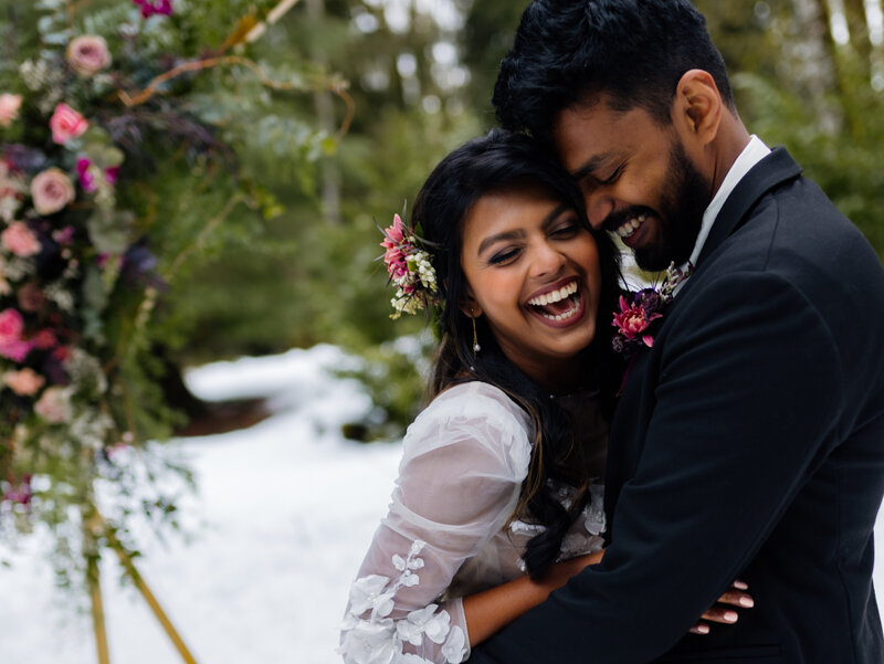  A winter wonderland elopement showcasing an adventurous couple surrounded by the majestic snow-capped mountains of the Pacific Northwest.