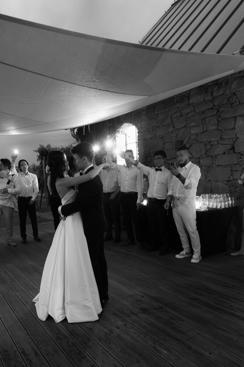 Luxury wedding in Europe – sophisticated bride in a modern wedding gown and groom in a timeless suit.