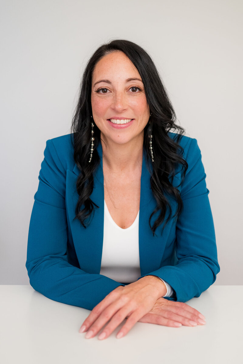A confident and successful sales woman ready to discuss leadership techniques.