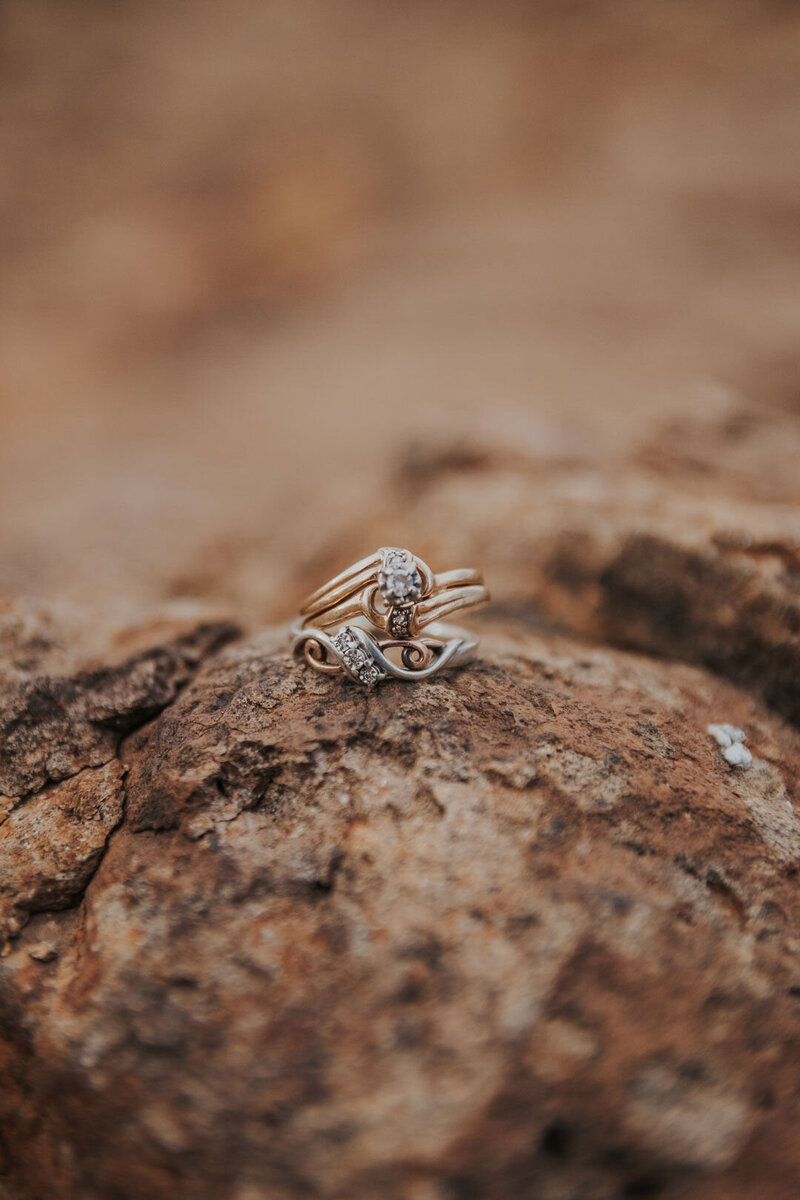 Engagement ring on rocks