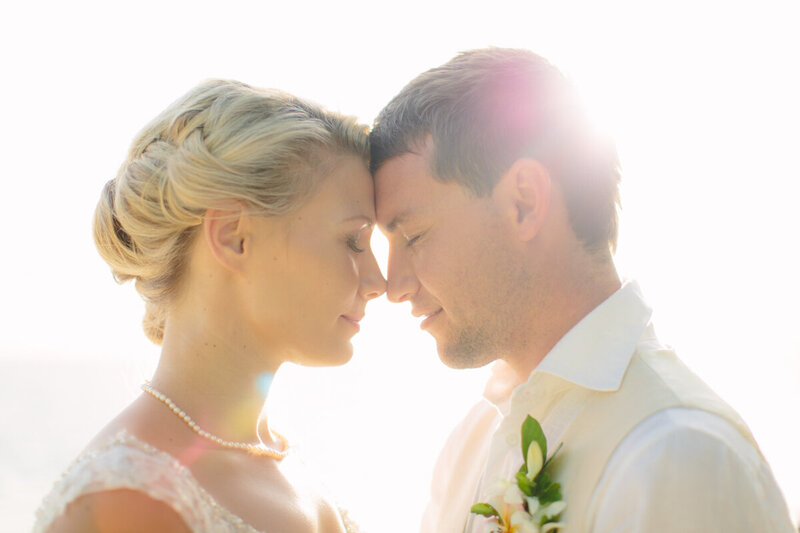 Couple forehead to forehead bride and groom