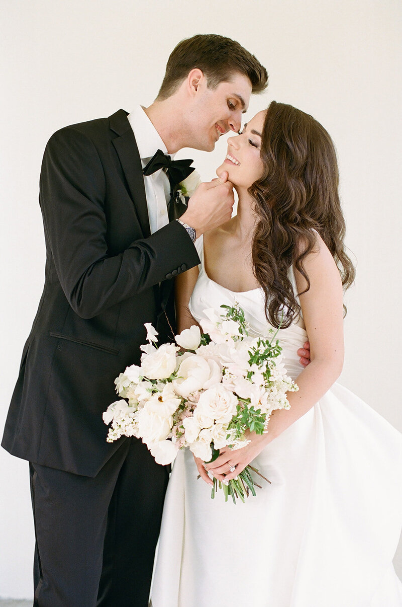bride and groom enjoy elegant wedding planned by Indianapolis wedding designer