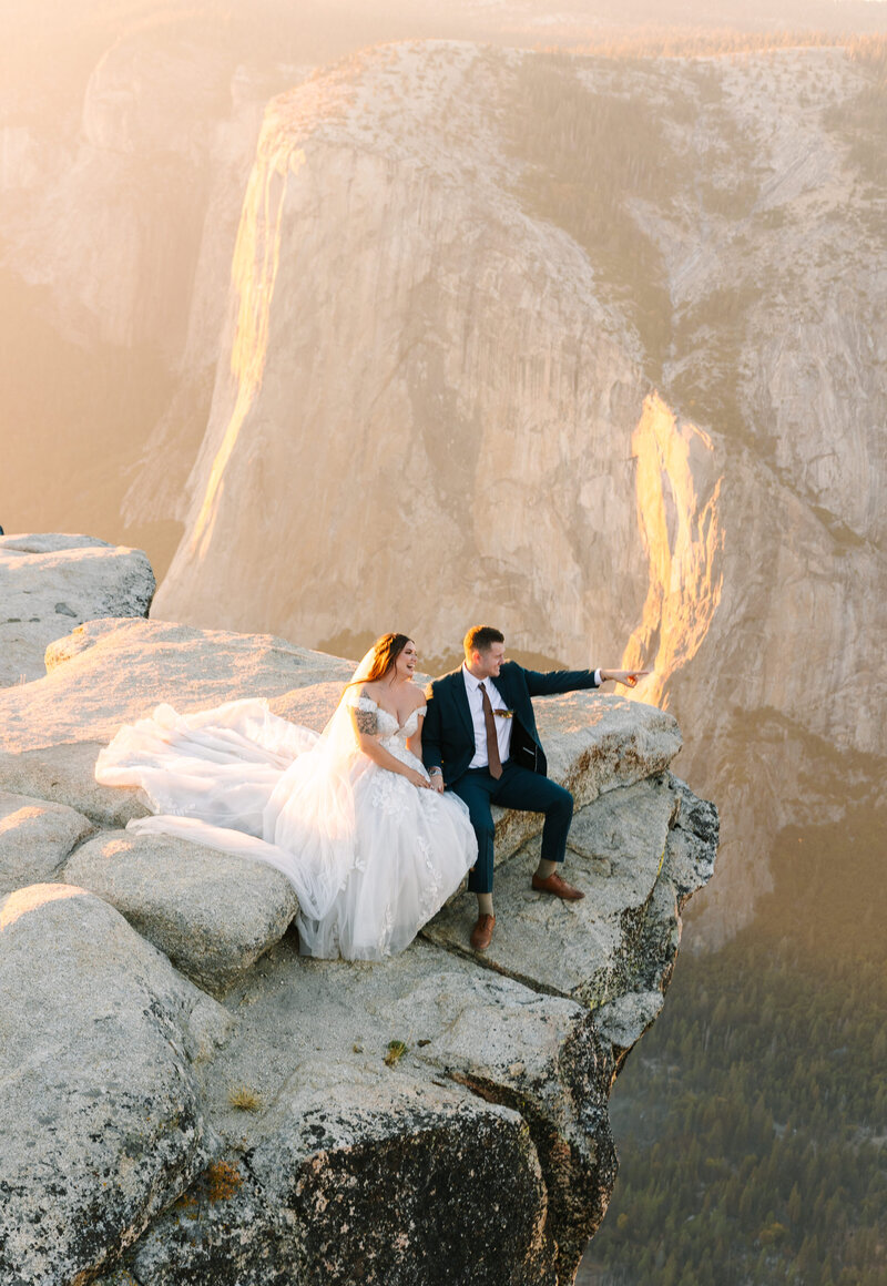 Bride & groom sitting on taft point