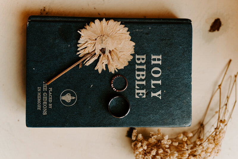 bible and wedding rings