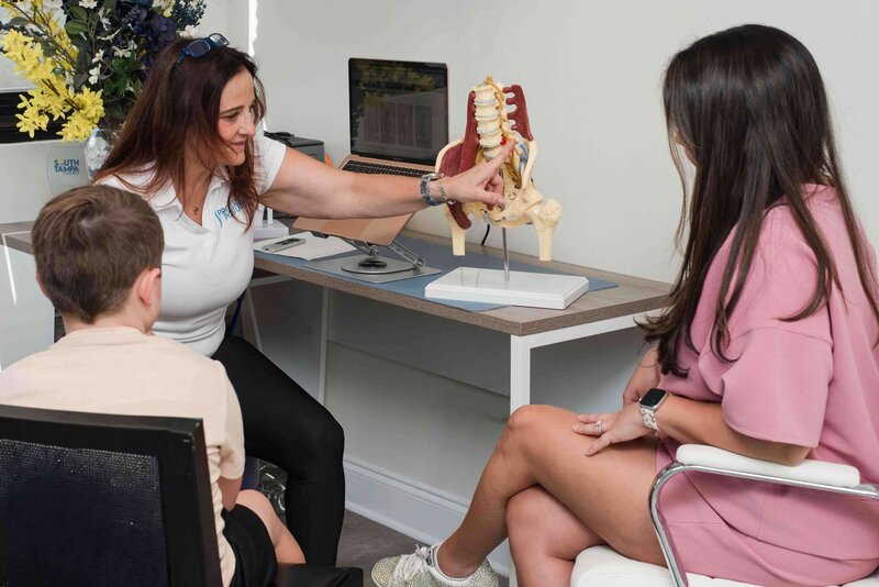 Tampa realtor reviewing house specifications with a client just prior to closing on the property.