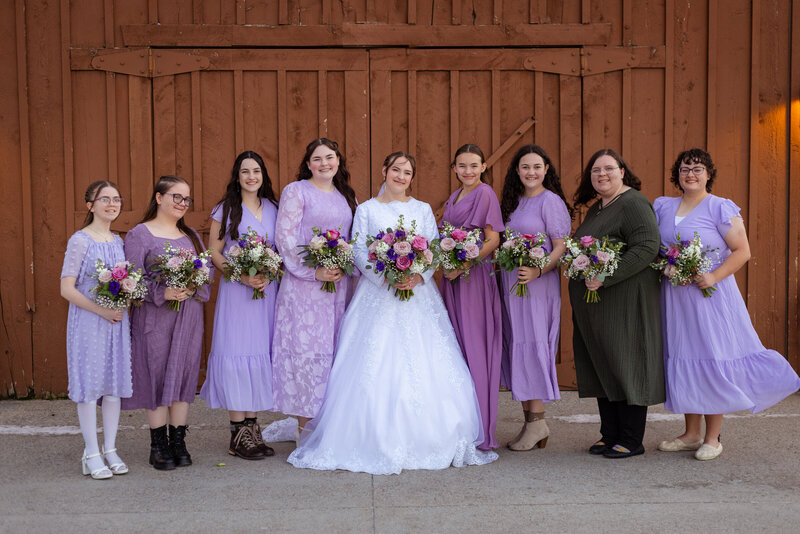 beautiful bouquet at her feet of the bride and grooms feet
