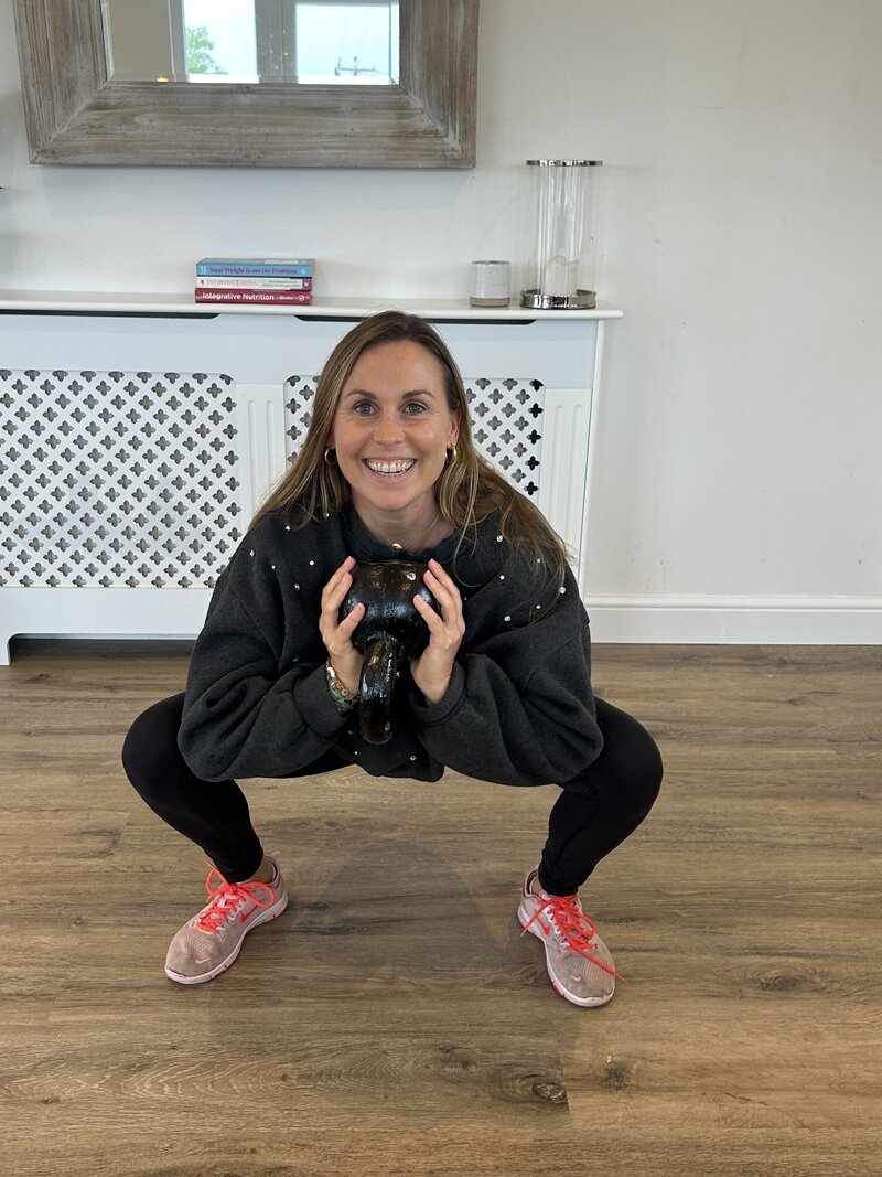 Demonstration of a goblet squat 