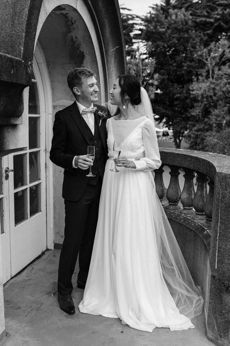 couple farm garden wedding christchurch bride groom elegant tall suit white dress modern bouquet