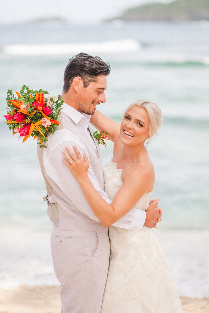 Couple forehead to forehead bride and groom