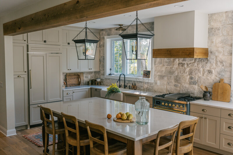 This luxurious custom home showcases refined transitional style with timeless traditional details. Located in the Midwest, it’s a standout example of our full-service interior design for new construction homes—including space planning, floor plan review, cabinetry, lighting, finishes, and more.