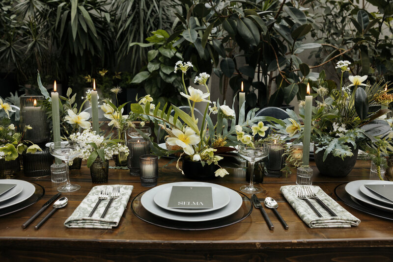 Botanical wedding tablescape with ezra lichen napkins and event essentials rentals Q Jancola