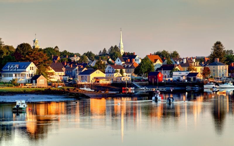 Cityscape image illustrating resources available for a smooth relocation. Explore Lauryn DeNenno’s comprehensive list of local experts, including home lenders, organizers, and movers, to streamline your moving process.
