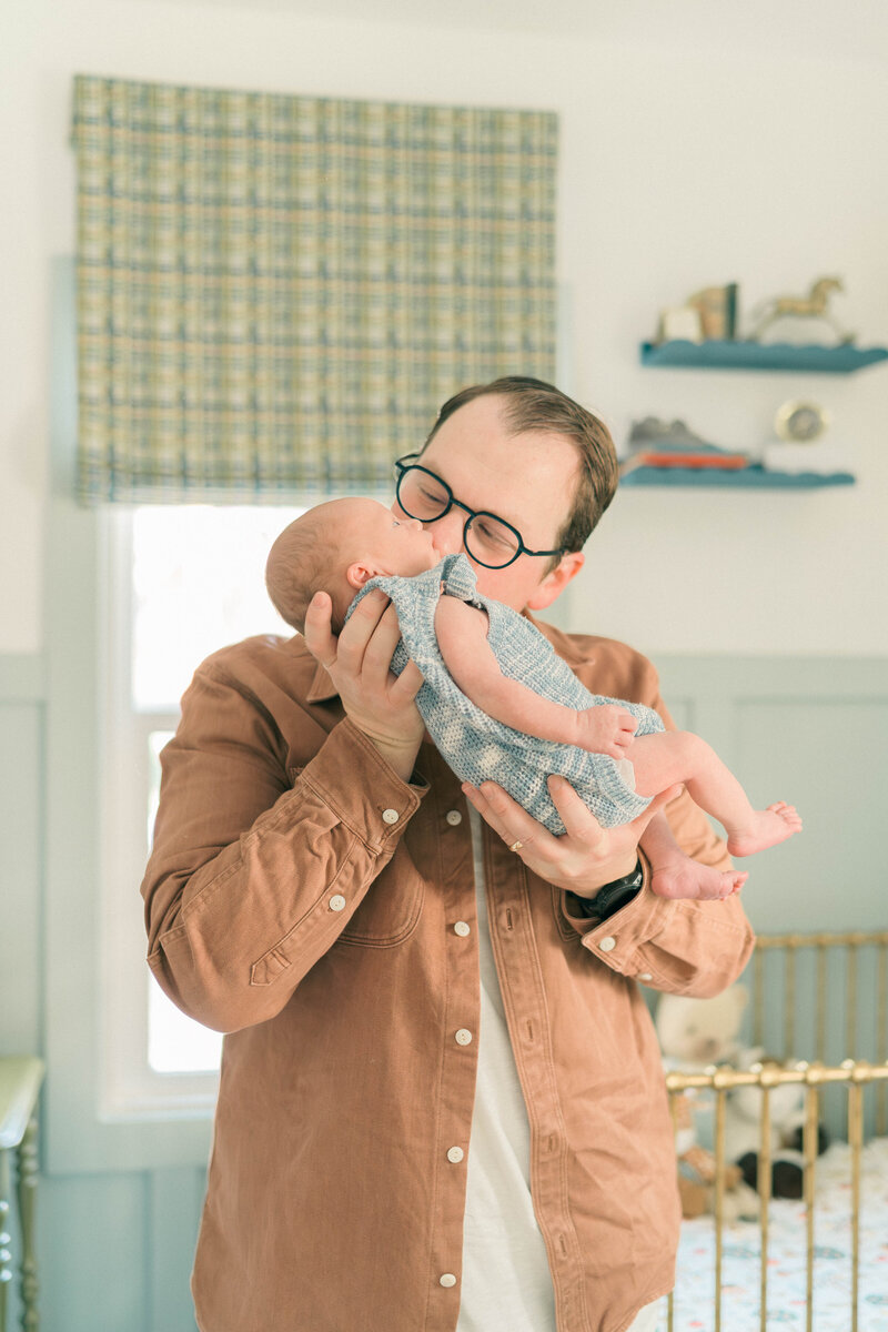MillCreek, Utah newborn photography by Iris Graciela. Soft, natural light lifestyle images capturing family connection at home.