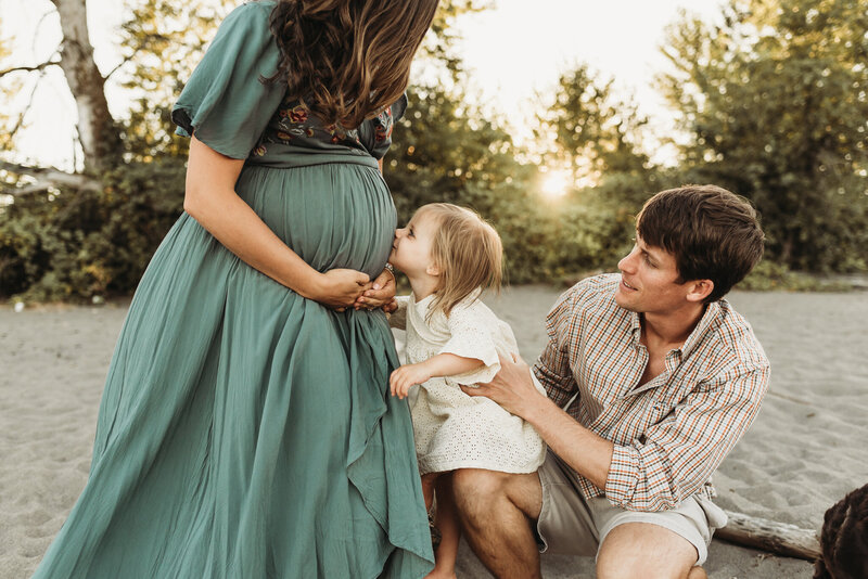 family at the beach maternity