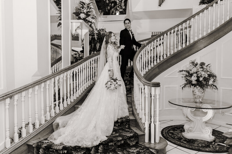 Black and white Newlywed photograph on a stair case in Garden Grove California