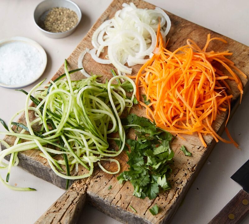 carrots, onion, cucumber and corridor on a chopping board