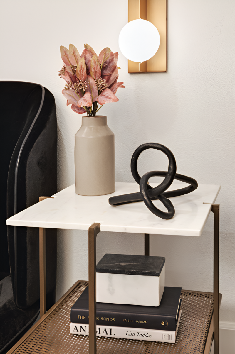 A detail shot of a neatly styled nightstand in a mountain modern bedroom in Park City by Sister Studio.