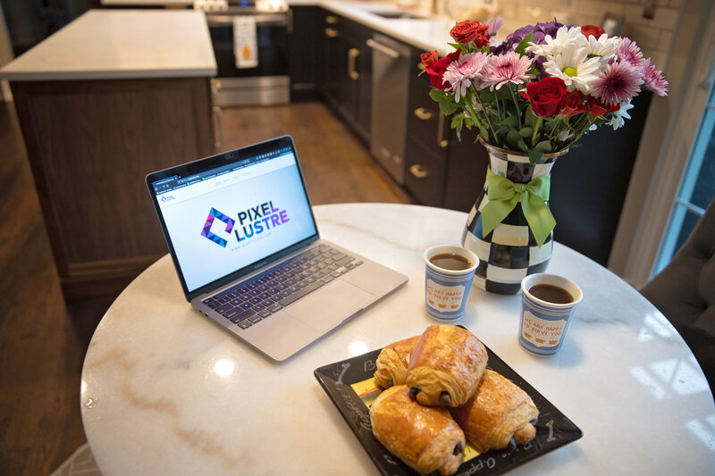 laptop on website with chocolate croissants