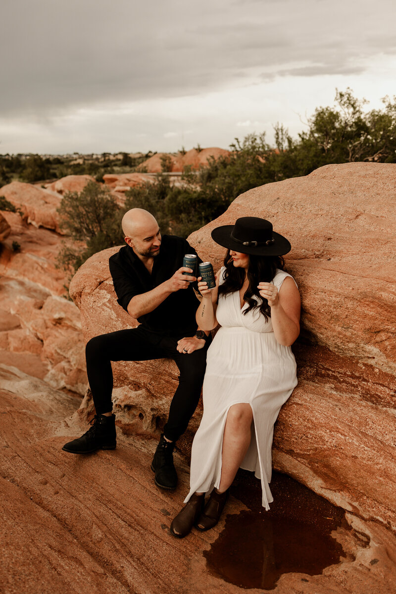 Garden of the gods Elopement couple drinking an IPA