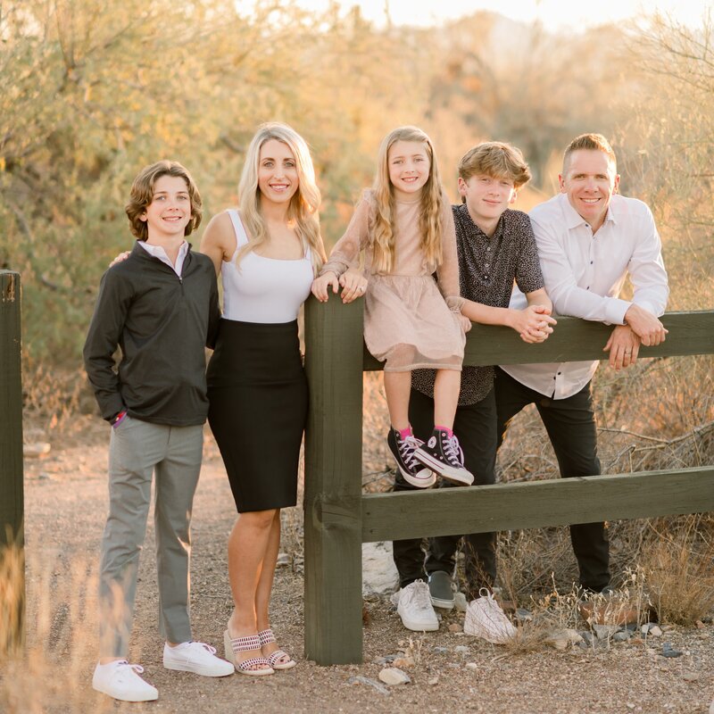 Family posing for family of 5  photos  in Silverleaf Neighborhood in Scottsdale Az