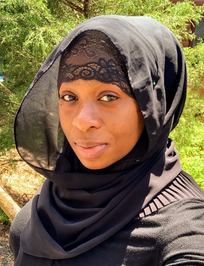 Portrait of a confident Me & She Doula professional.