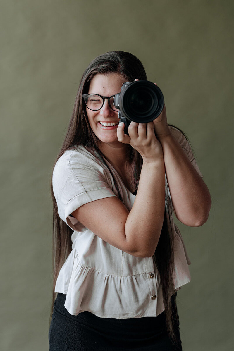rachel boyd poses for a photo during a branding photoshoot