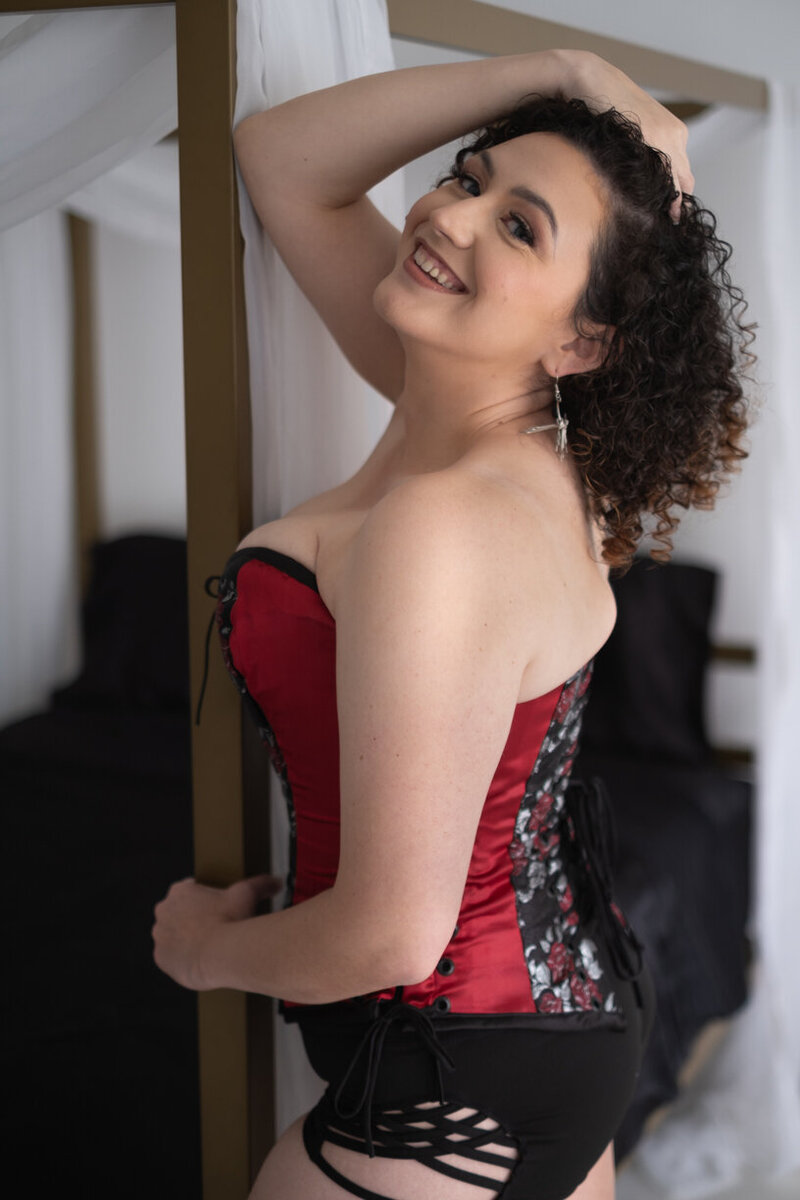 Luxury boudoir portrait woman in white lace bodysuit