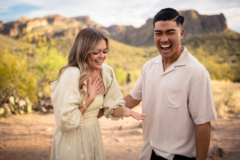 couple smiling after proposal