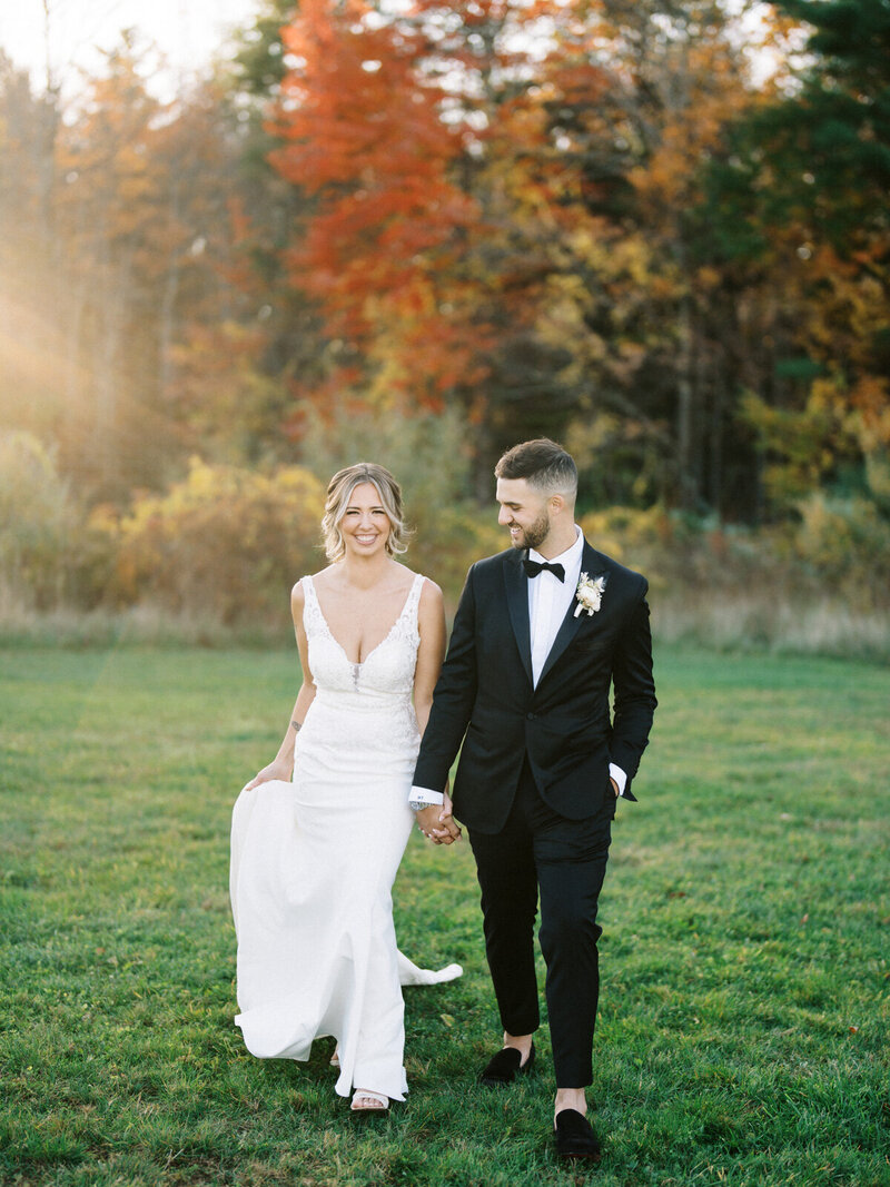 Bride and groom walk up memorial steps at their DC wedding