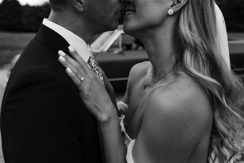 An indie LGBTQ+ couple’s moody editorial wedding portrait, photographed in a true-to-color style by Chelsea Stanford in Missouri