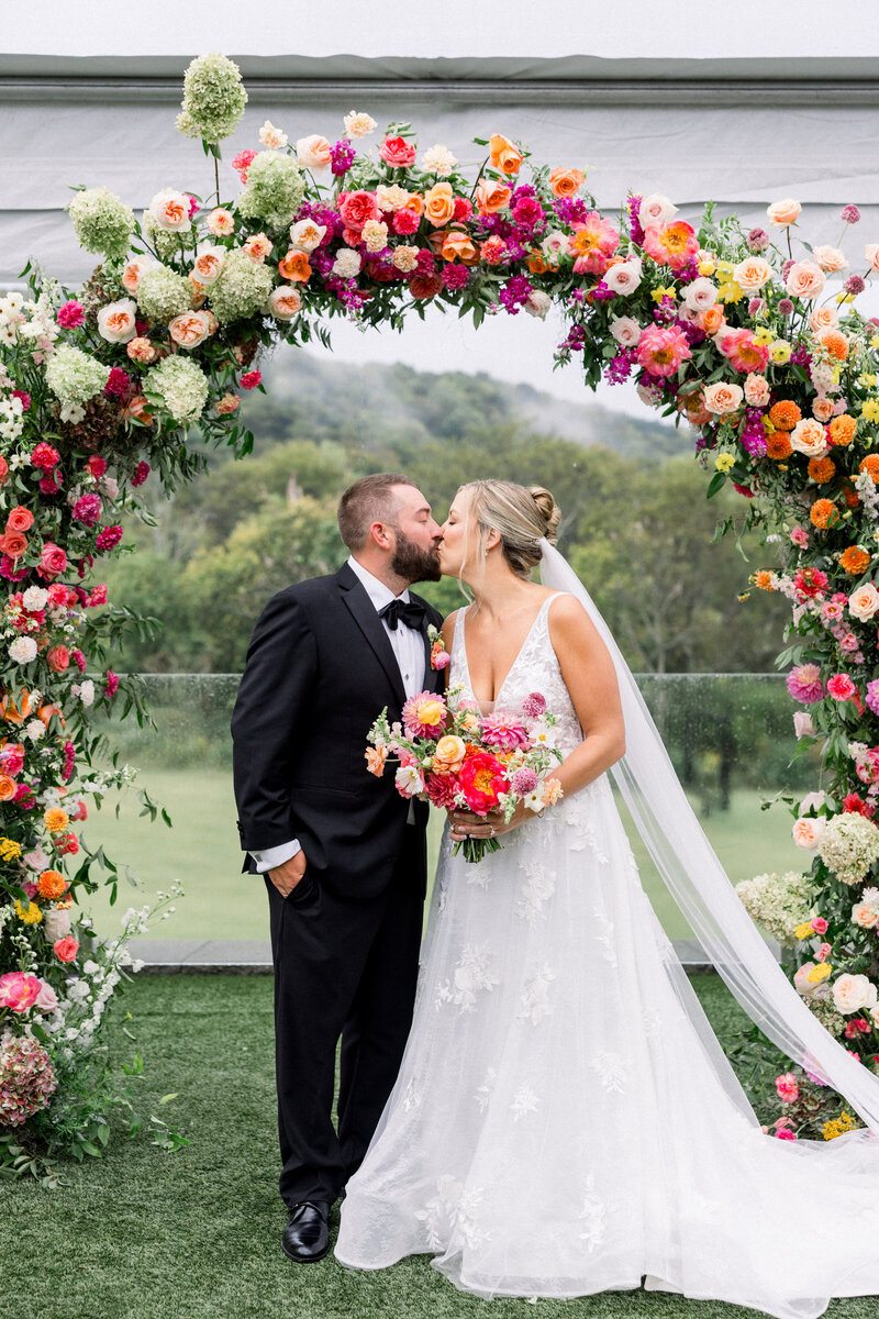 Bride and groom walk up memorial steps at their DC wedding