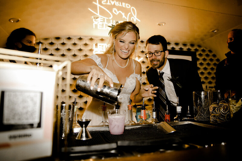 Bride and Groom making a cocktail in The Byrd