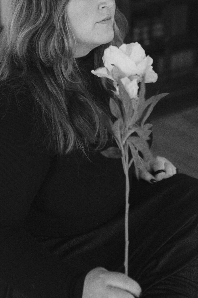 Woman holding a flower