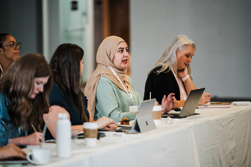 WPCEO Summit Attendees engaging in discourse