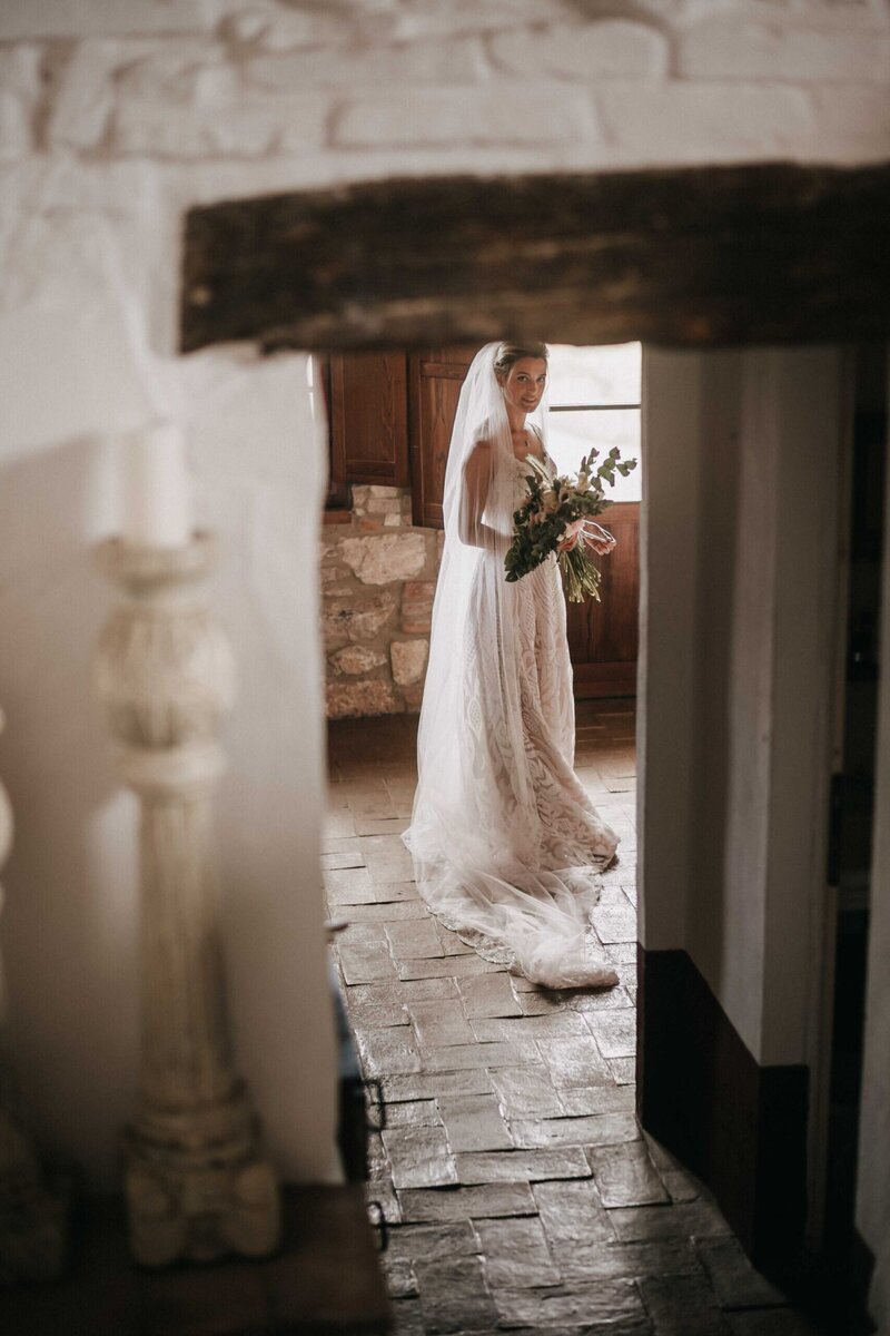 bride getting ready intimate wedding in tuscany