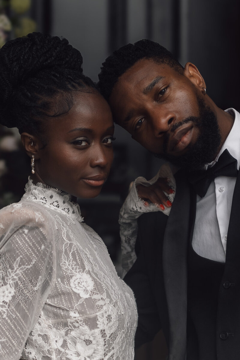 Wedding photographer captures couple taking a stroll hand in hand at their french chateau wedding.