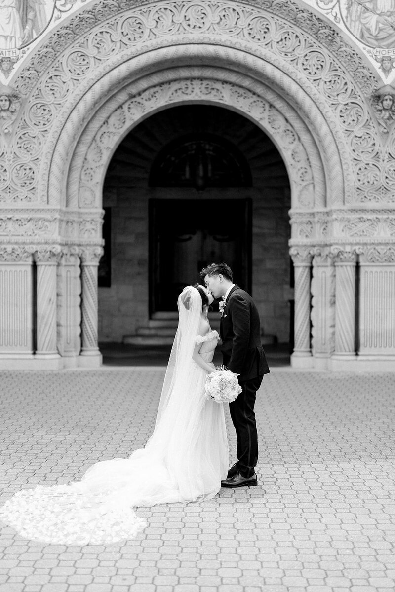 Romantic Kiss Under the Arch at Stanford Memorial Church, California