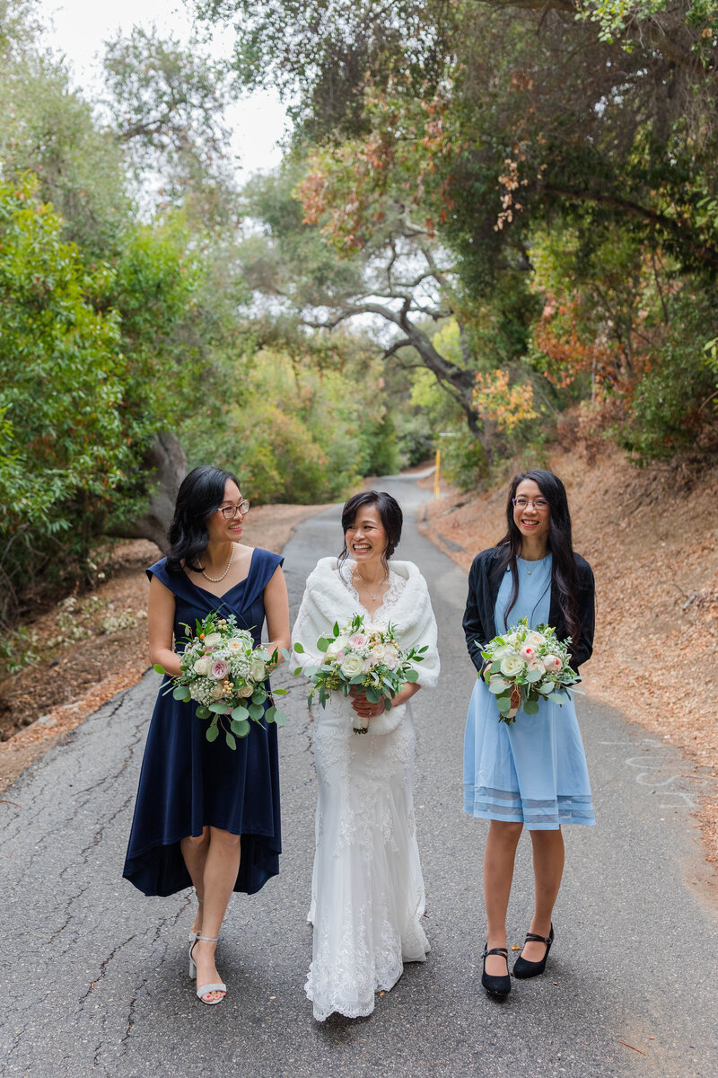 Bridesmaids smiling at Inn of the Seventh Ray wedding